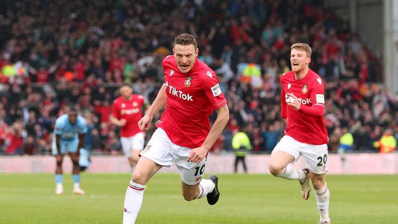 Paul Mullin celebrates after scoring for Wrexham in their promotion decider against Boreham Wood (Image: Jan Kruger/Getty Images)