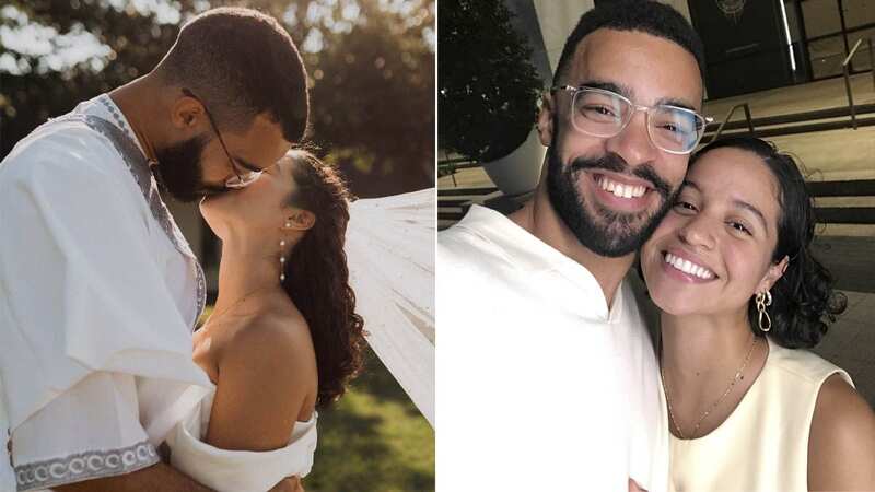 Eleazer and Keylin Akuchie on their wedding day sharing a first kiss (Image: Daylilies Photography / SWNS)