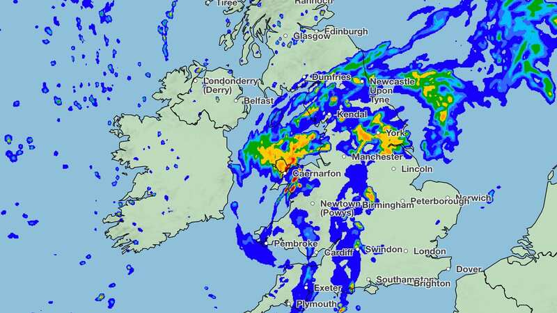 Heavy downpours were forecast for most parts of the country throughout the day (Image: PA)