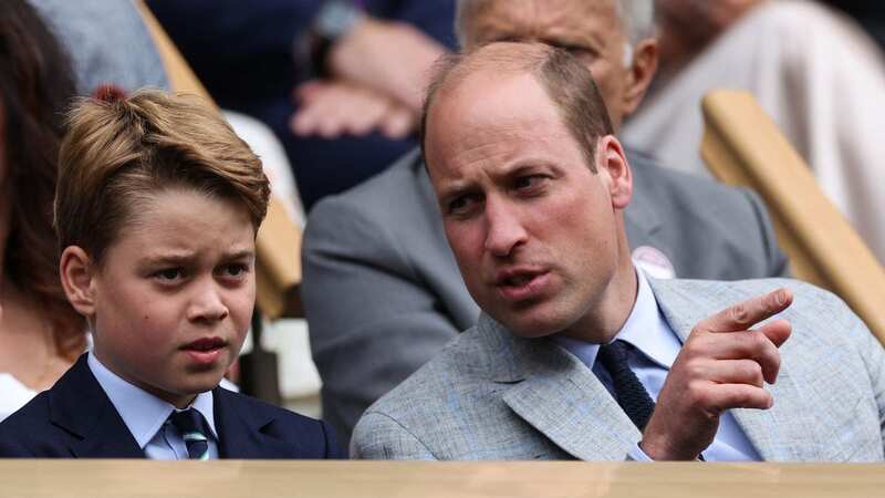 Prince George with his father Prince William (Image: AFP via Getty Images)