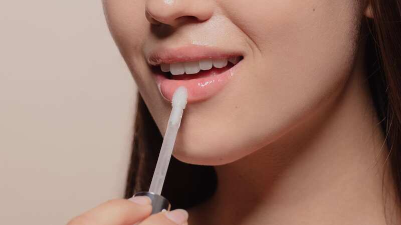 Lip oils are a must for your summer beauty routine (Image: Getty)