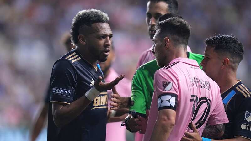 Messi celebrates with Josef Martinez