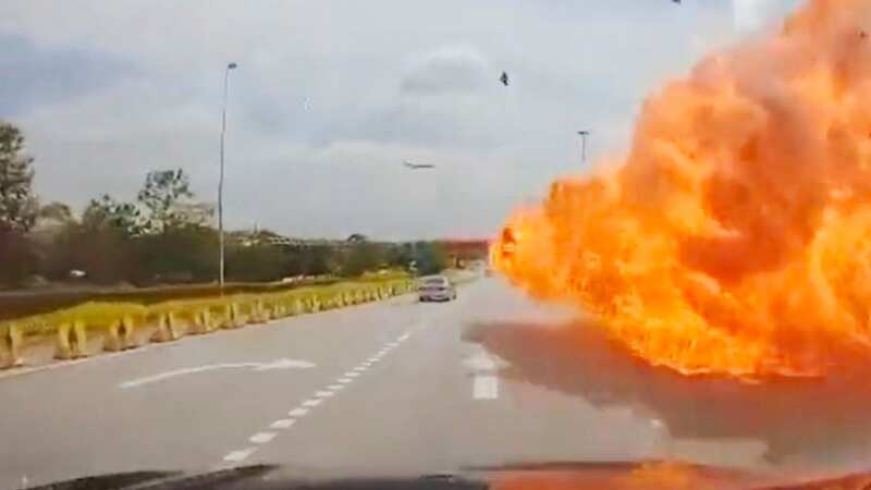 Terrifying moment plane erupts in fireball as it crashes on motorway killing 10