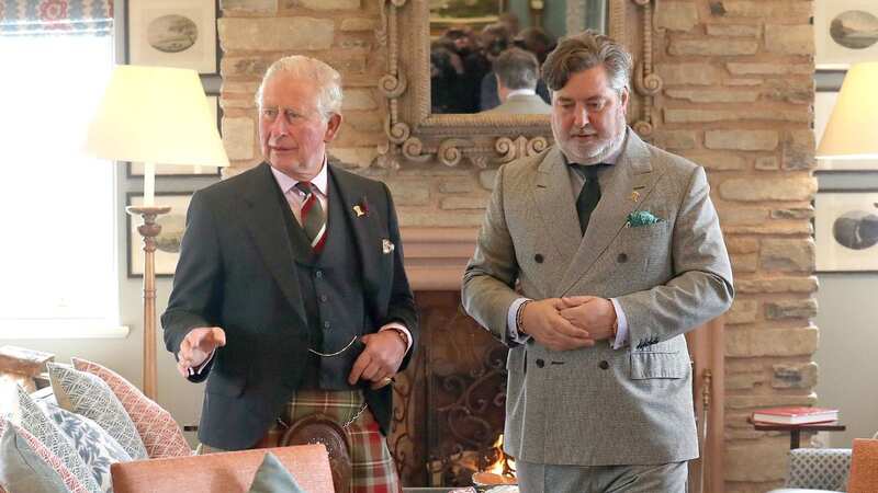 The Prince of Wales, known as the Duke of Rothesay while in Scotland, with Michael Fawcett (right) (Image: PA)
