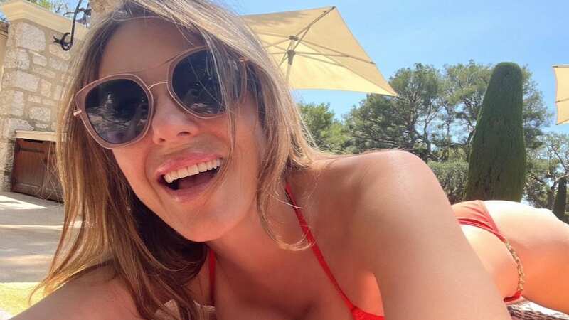 Liz Hurley wows fans as she poses completely nude on an inflatable watermelon