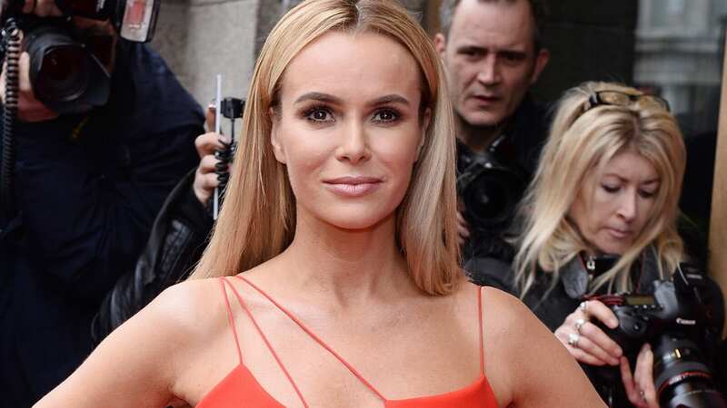 Amanda Holden hit out after being targeted by scammers (Image: Getty Images)