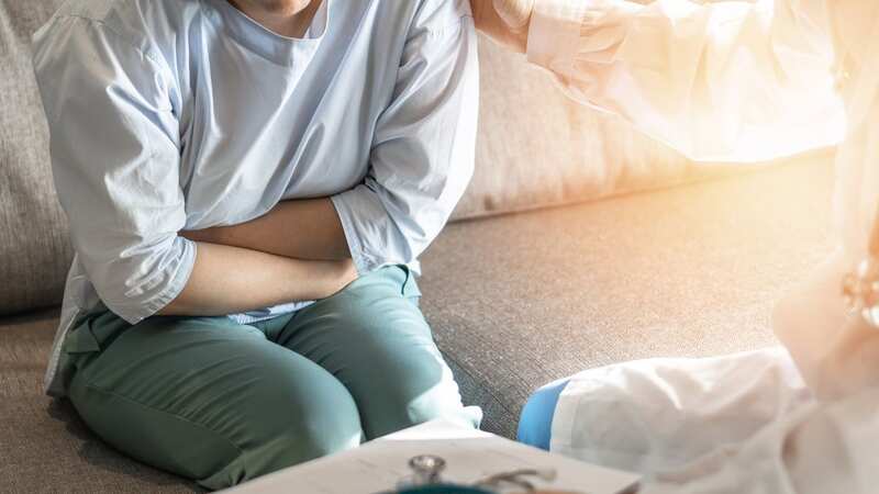 Abdominal pain is a common symptom of bowel cancer (Image: Getty Images/iStockphoto)