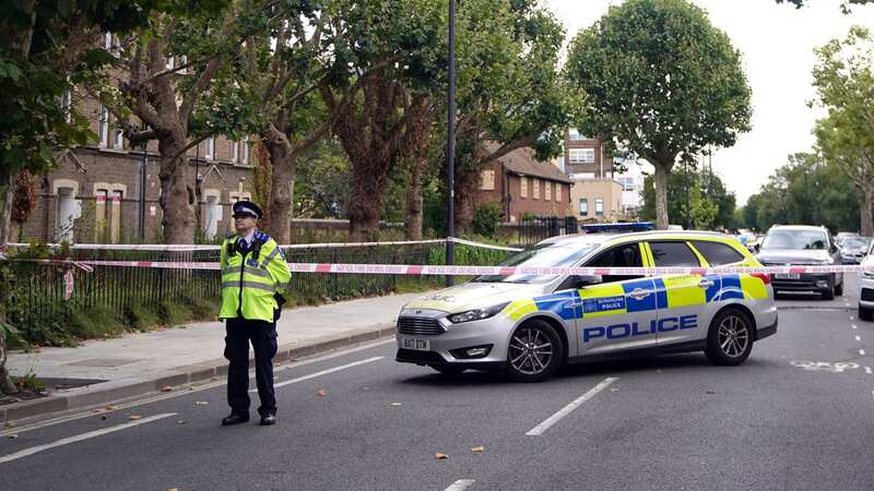 Officers at the scene of the incident (Image: PA)