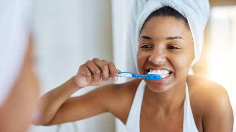 One tell-tale symptom can be noticed when brushing your teeth (Image: Getty Images/iStockphoto)