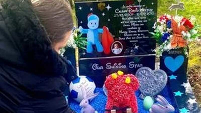 Mum Louise Thompson tending to the memorial she has been told to tear down (Image: Hull Daily Mail / MEN Media)