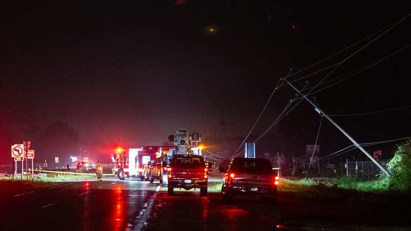 Emergency services were busy with fallen trees, power lines, and car crashes (Image: AP)