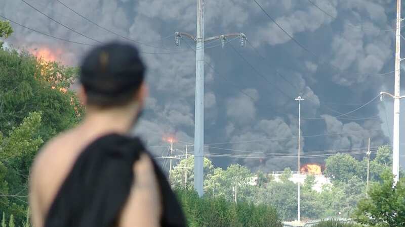 A concerned local watches on (Image: WWL-TV/Twitter)