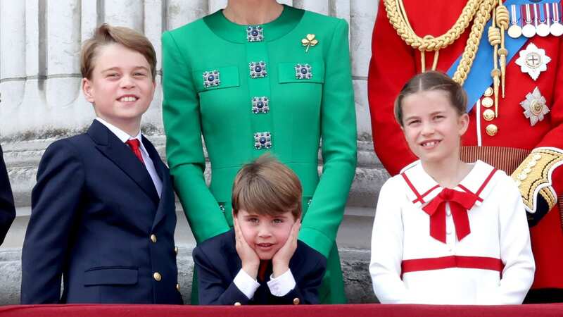 Prince William and Princess Kate are pictured with their children in June (Image: Getty Images)