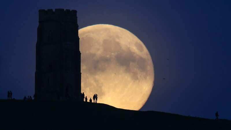 A supermoon rises over Glastonbury Tor - a Blue Moon back in 2015 (Image: Getty Images)