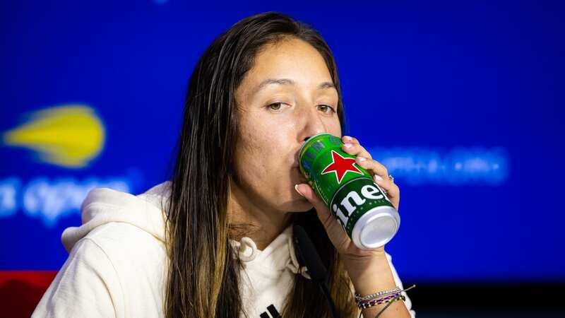 Jessica Pegula drinks a can of Heineken while talking to the media