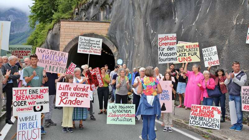 Villagers blocked the tunnel leading into the town (Image: APA/AFP via Getty Images)