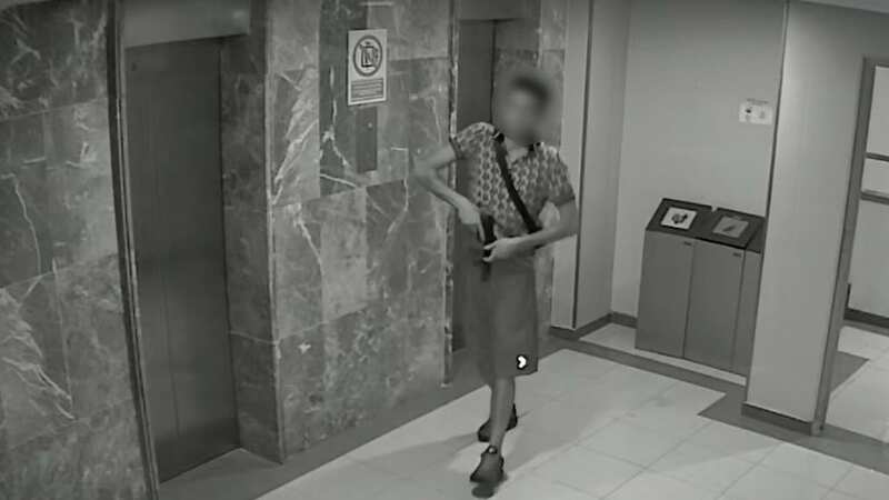 A CCTV still shows the man brandishing a replica gun at a hotel in Magaluf (Image: SOLARPIX.COM)