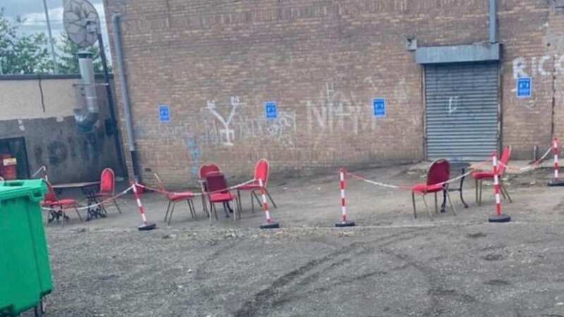 Tables and chairs are roped off at the back of the Brass Button in Motherwell (Image: Craig Campbell)