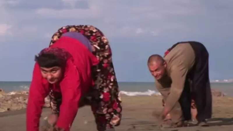 A family was discovered walking on all fours (Image: 60 Minutes Australia/YouTube)
