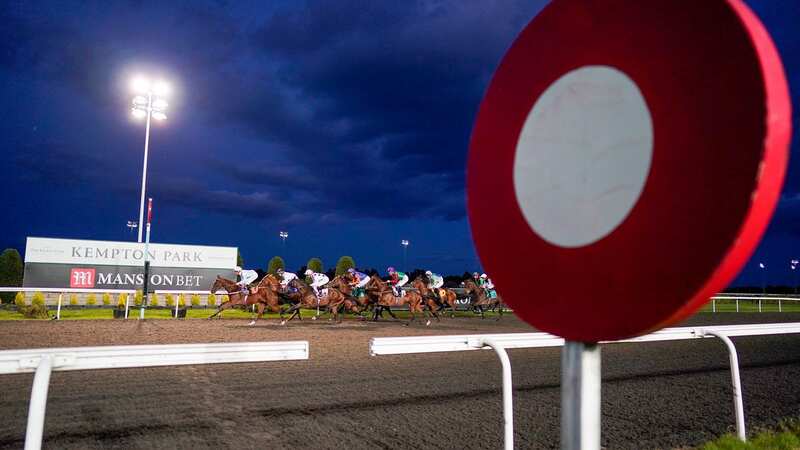 SUNBURY, ENGLAND - SEPTEMBER 29: A general view as runners pass the winning post on the first circuit during The MansionBet Watch And Bet Handicap at Kempton Park Racecourse on September 29, 2021 in Sunbury, England. (Photo by Alan Crowhurst/Getty Images)