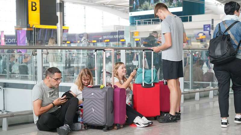 Passengers wait at Heathrow (Image: PA)