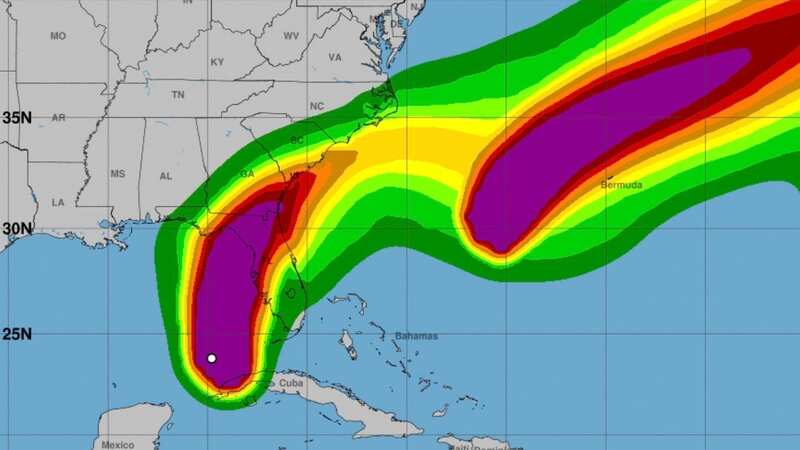 Maps are showing that the storm may take the form of a rare weather event where the hurricane is expected to loop around and hit Florida twice (Image: National Hurricane Center)