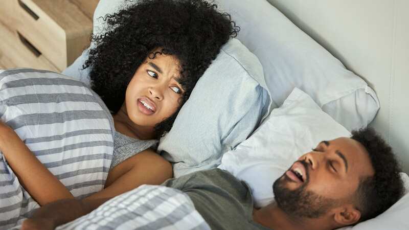 Snoring at night can be a nightmare for your loved ones (stock photo) (Image: Getty Images)