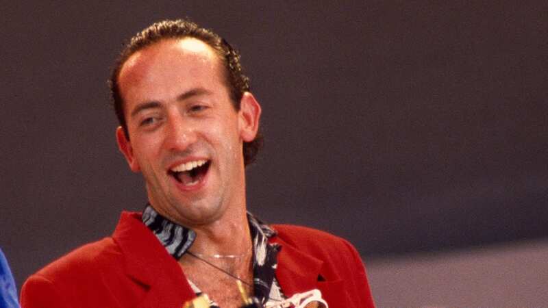 Jack Sonni (centre) performing at Live Aid with Mark Knopfler and Sting (Image: Getty Images)