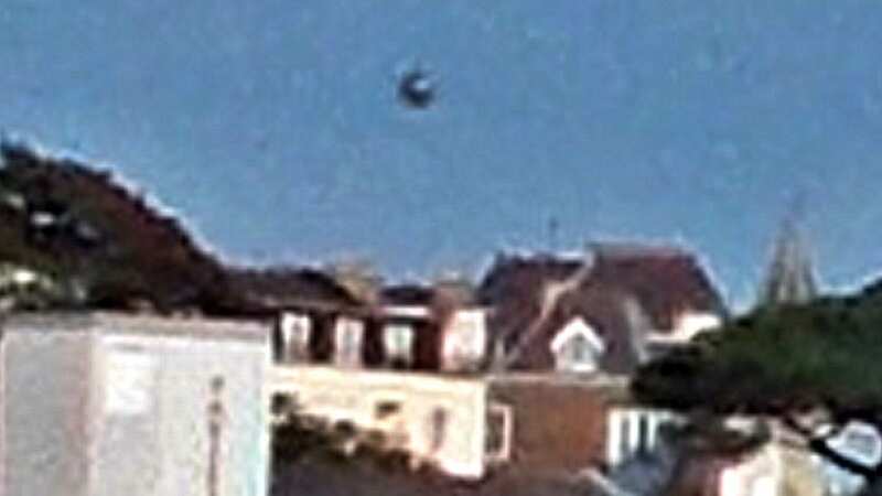 John Mooner, a full-time UFO investigator, was taking a day off at Exmouth Beach when he spotted something strange (Image: Credit: John Mooner/Pen News)