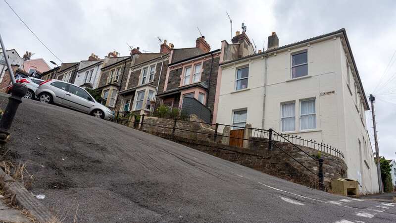 Benji Appleby-Tyler 45 of Vale Street in Bristol which has been named the steepest street in the UK (Image: Tom Wren SWNS)