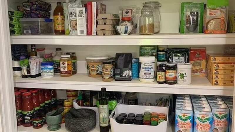 Candice posted a photo after she spent hours organising her food cupboard (Image: Facebook)