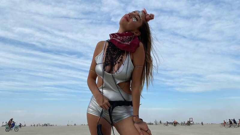Celebrity photographer Jana Schuessler attended Burning Man and escaped 