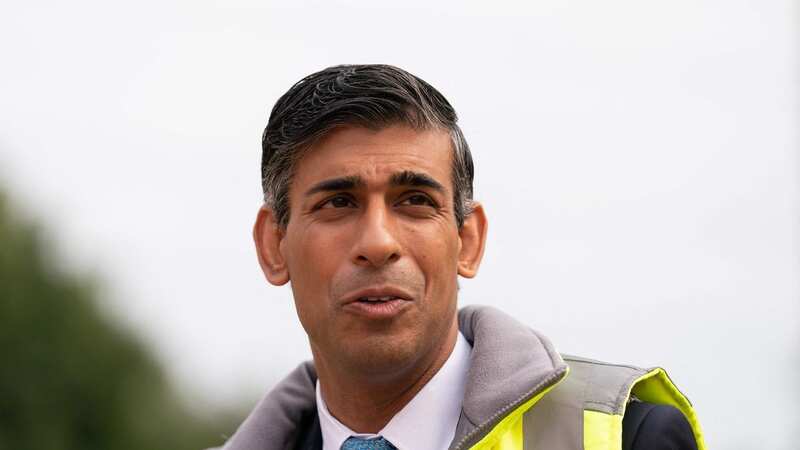 Rishi Sunak is under fire over the escalating crisis with dodgy concrete in schools (Image: POOL/AFP via Getty Images)