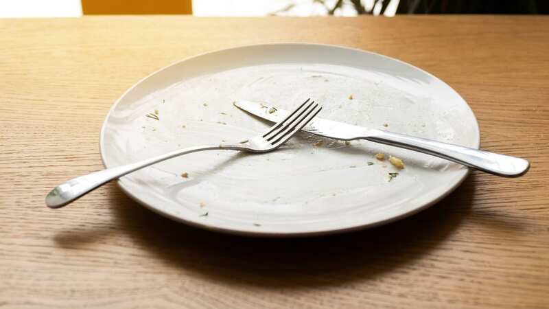 Grey marks on dinner plates are actually from cutlery - and are easy to remove (Image: Getty Images)