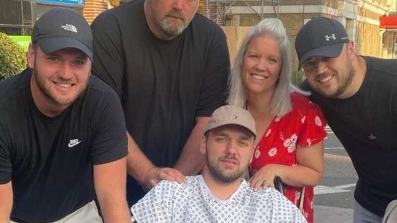 Joshua Warner with his parent and brothers (Image: / SWNS)