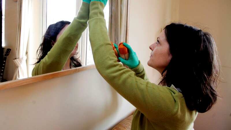 Giving the house a deep clean can be an effective way to work the muscles (Image: © SWNS)