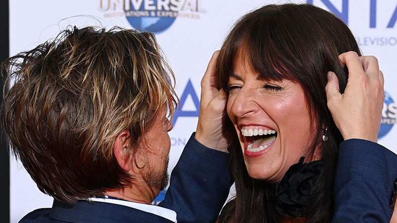 Loved-up Davina McCall mucks around with boyfriend Michael Douglas at the NTAs