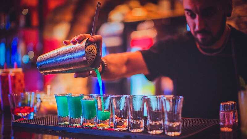 Bars in the Corfu party resort of Kavos have been rumbled reselling half-consumed booze to unsuspecting customers (Image: Getty Images)