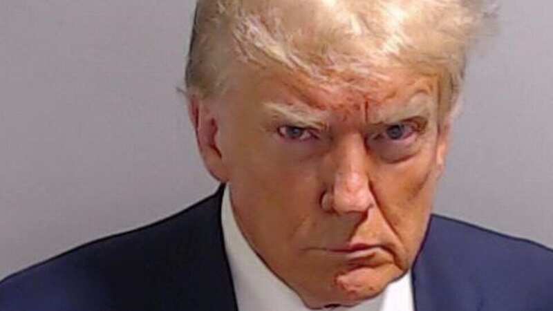 Donald Trump was photographed for a police mug shot after his arrest on August 24 (Image: FULTON COUNTY SHERIFF