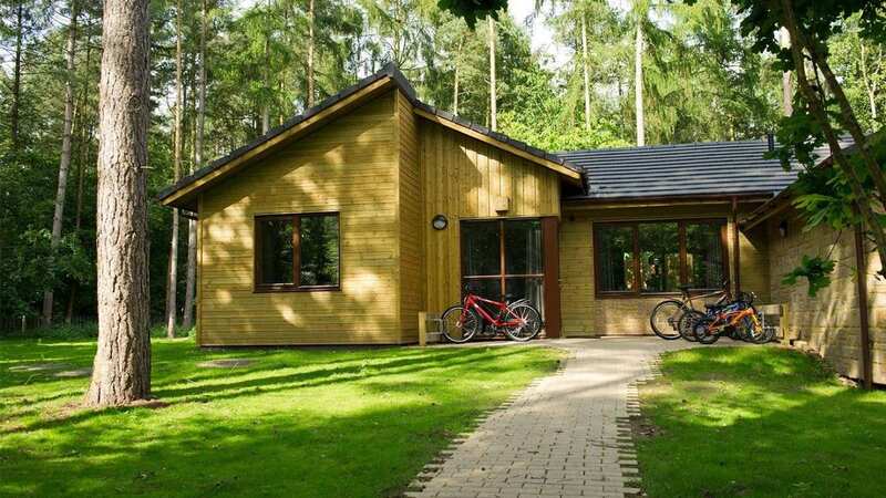 Save money on your next luxury cabin stay (Image: Centre Parcs)