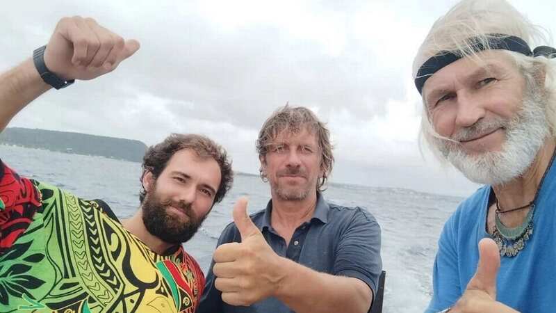 Evgeny Kovalevsky, Stanislav Berezkin and Vincent Thomas Etienne were rescued after sharks attacked their catamaran (Image: @russian.ocean.way/Instagram)