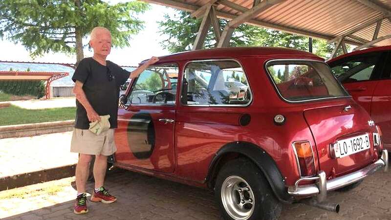 Mike Evans with his beloved Mini (Image: SOLARPIX.COM)