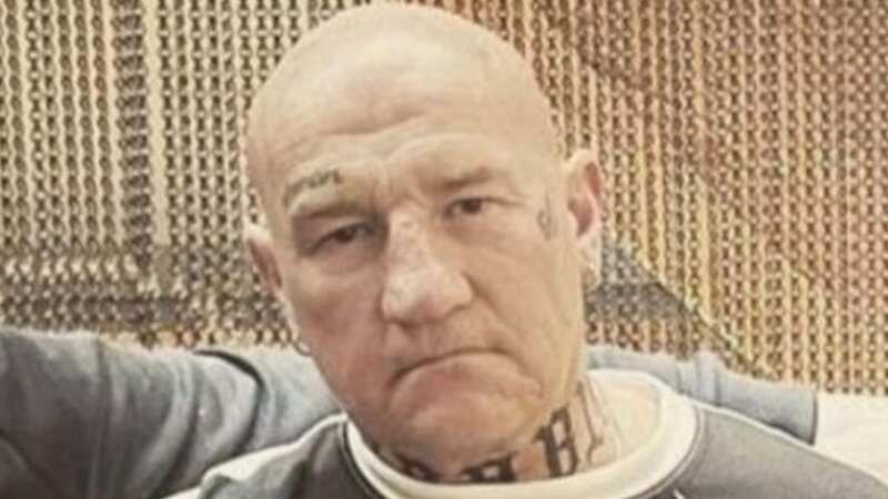 Moment notorious gangster gunned down in broad daylight while eating at cafe