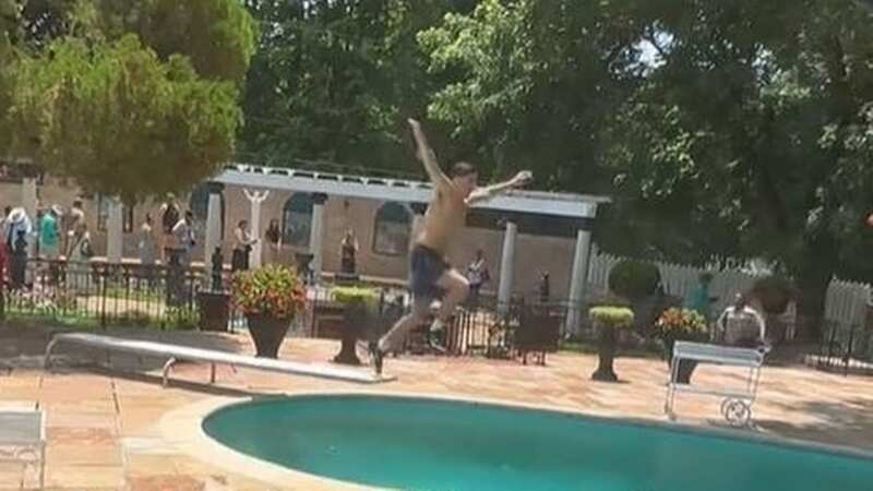 The tourist was seen jumping into the pool at Elvis