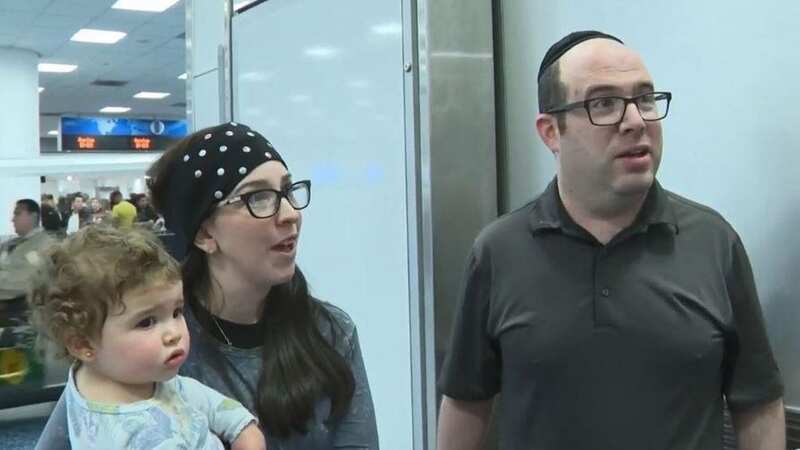 Couple and baby kicked off flight after passengers complain they 