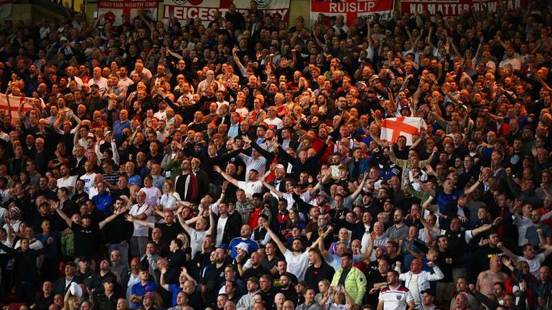 England fans celebrate the opening goal at Hampden Park.