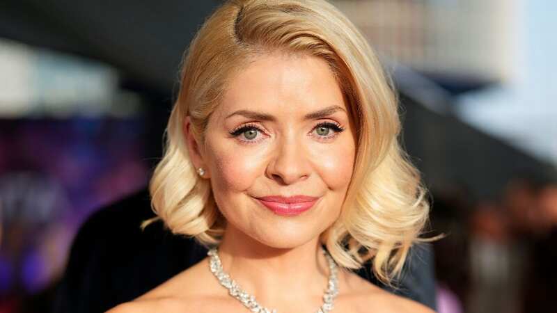 Holly is well-known for her iconic blonde bouncy locks (Image: Scott Garfitt/REX/Shutterstock for NTA)