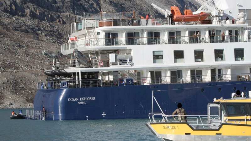 The Ocean Explorer, a Bahamas-flagged Norwegian cruise ship with 206 passengers and crew, has ran aground in northwestern Greenland (Image: AP)