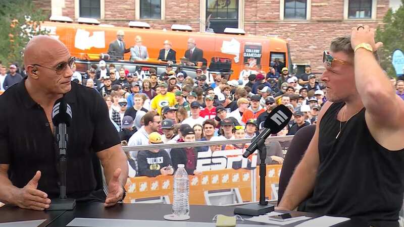 The Rock sent wrestling fans wild in a jam-packed interview with Pat McAfee. (Image: ESPN)