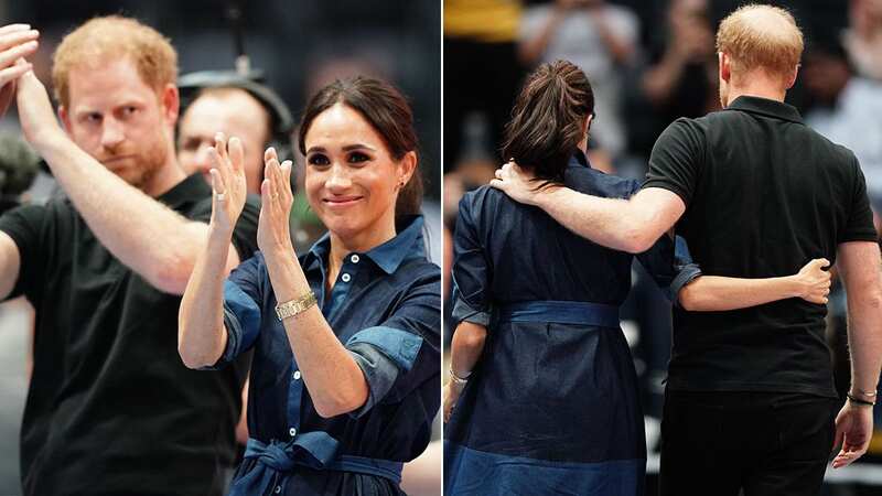 Meghan Markle and Prince Harry sweetly embraced at the Invictus Games (Image: PA)